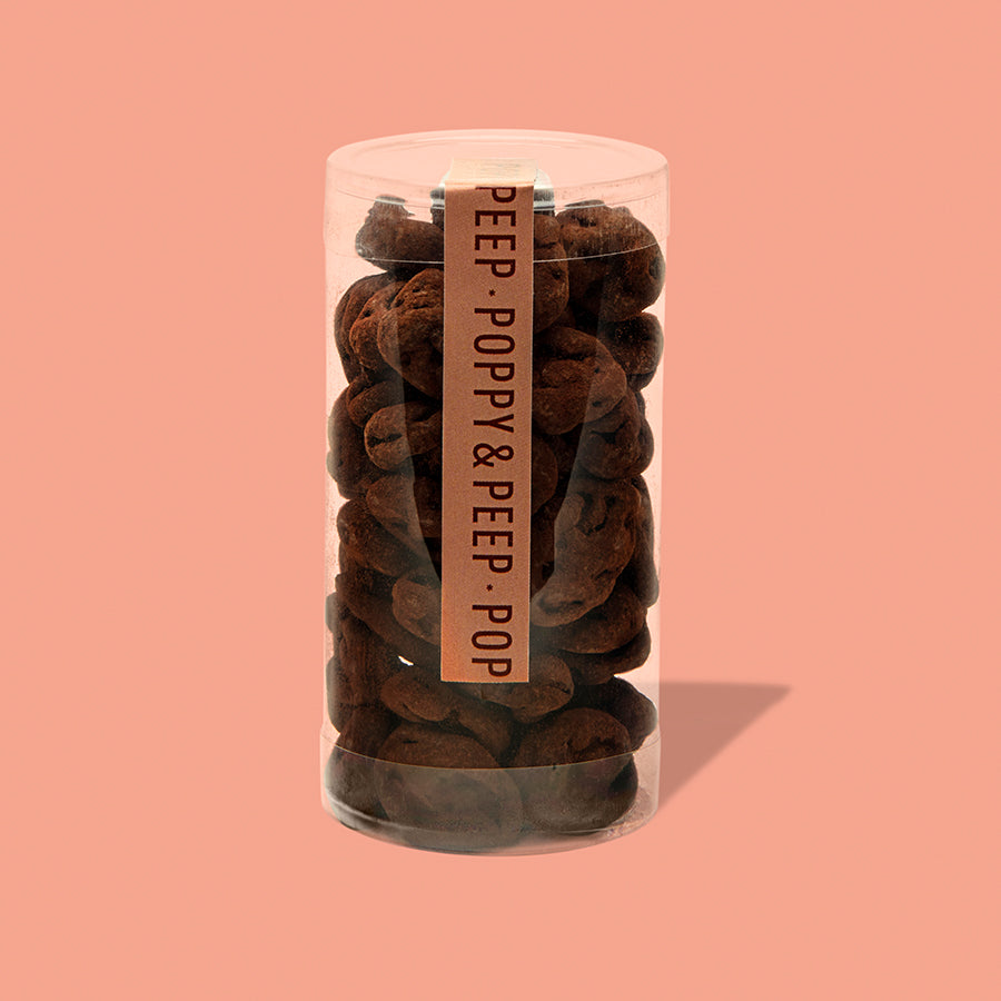 Poppy & Peep dark chocolate covered dried cherries dusted with cocoa in a clear tube