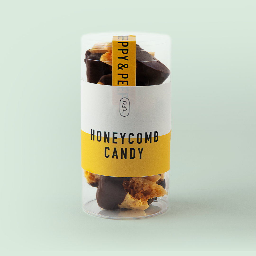 Chocolate dipped honeycomb candy pieces in a Poppy & Peep tube