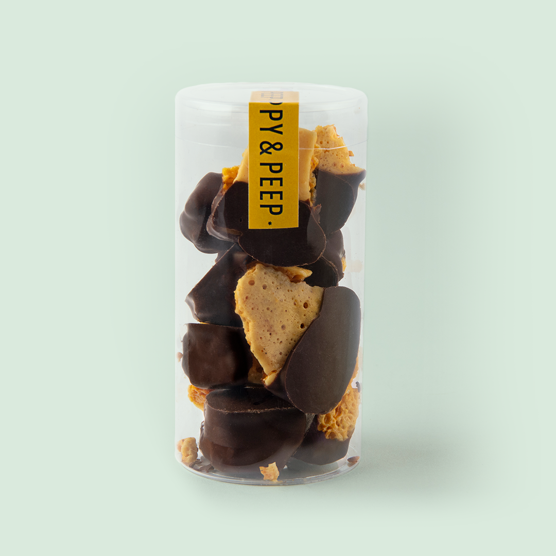 Poppy & Peep dark chocolate covered honeycomb candy in a clear tube